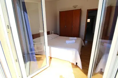 Krevet ili kreveti u jedinici u objektu Primošten Cozy Guest House Helena