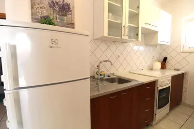 Kuhinja ili čajna kuhinja u objektu Primošten Cozy Guest House Helena