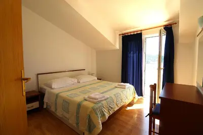 Krevet ili kreveti u jedinici u objektu Primošten Cozy Guest House Helena