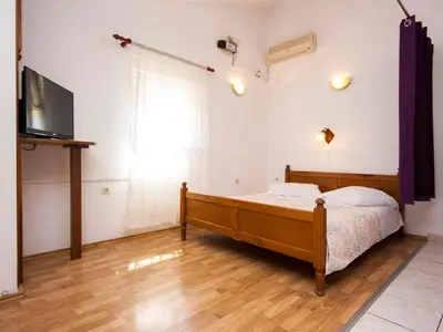 Krevet ili kreveti u jedinici u objektu Apartments Škarpa 1601