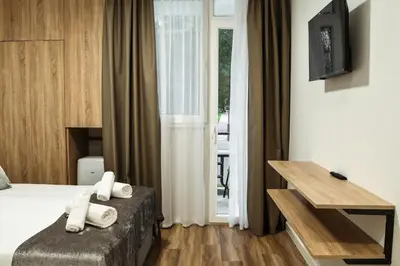 Krevet ili kreveti u jedinici u objektu hotel depandance Imperial Green by GLOBTOUR
