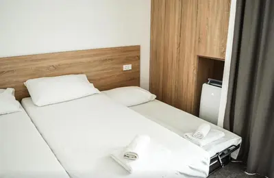 Krevet ili kreveti u jedinici u objektu hotel depandance Imperial Green by GLOBTOUR