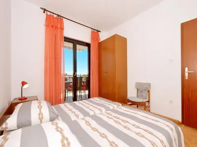 Krevet ili kreveti u jedinici u objektu Apartments Petar