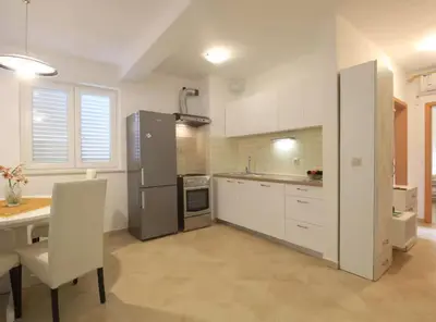 Kuhinja ili čajna kuhinja u objektu Srima To Relax Apartment