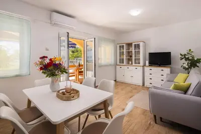 TV i/ili zabavni centar u objektu Puncet Apartments - 2BR with big terrace and BBQ
