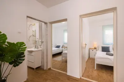 Krevet ili kreveti u jedinici u objektu Puncet Apartments - 2BR with big terrace and BBQ