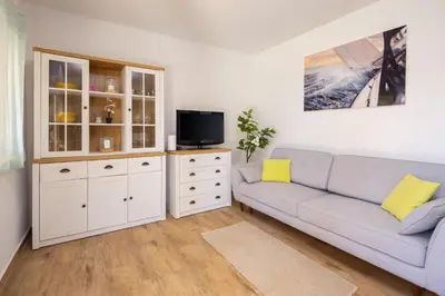 TV i/ili zabavni centar u objektu Puncet Apartments - 2BR with big terrace and BBQ
