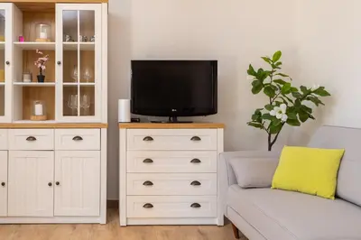 TV i/ili zabavni centar u objektu Puncet Apartments - 2BR with big terrace and BBQ