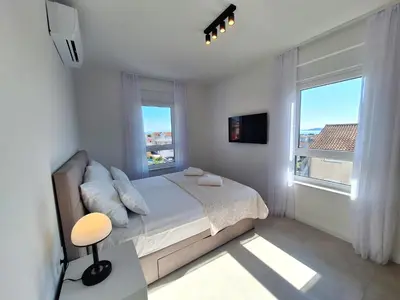 Krevet ili kreveti u jedinici u objektu Andigo Seaview Apartment Vodice