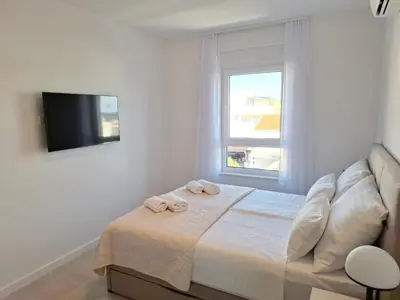 Krevet ili kreveti u jedinici u objektu Andigo Seaview Apartment Vodice