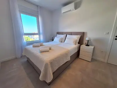Krevet ili kreveti u jedinici u objektu Andigo Seaview Apartment Vodice