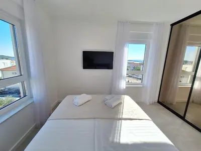 Krevet ili kreveti u jedinici u objektu Andigo Seaview Apartment Vodice