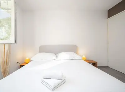 Krevet ili kreveti u jedinici u objektu Charming Garden Apartment Kate