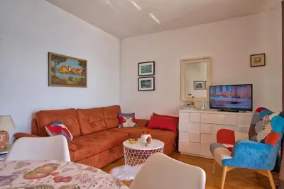 TV i/ili zabavni centar u objektu Apartment Sunset