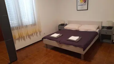 Krevet ili kreveti u jedinici u objektu Apartments Marta