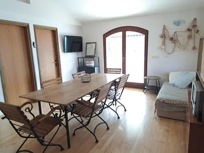 TV i/ili zabavni centar u objektu Apartments Karmela