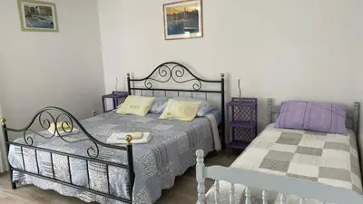Krevet ili kreveti u jedinici u objektu Apartments Karmela