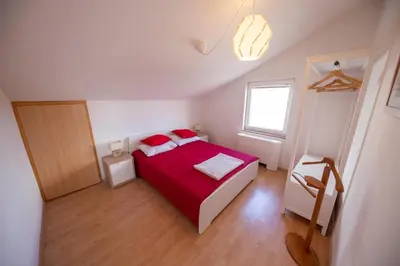 Krevet ili kreveti u jedinici u objektu Apartments Leonarda