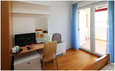 TV i/ili zabavni centar u objektu Guest House Lav