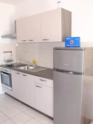 Kuhinja ili čajna kuhinja u objektu Apartment Joso