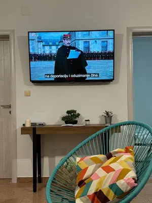 TV i/ili zabavni centar u objektu Apartments Leona
