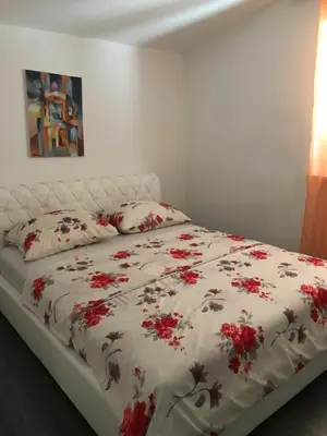 Krevet ili kreveti u jedinici u objektu Apartments Leona