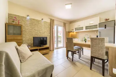 TV i/ili zabavni centar u objektu Apartments Sea Vodice