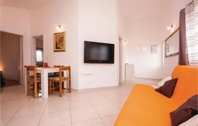 TV i/ili zabavni centar u objektu Apartment Dolac With Sea View 10