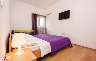 Krevet ili kreveti u jedinici u objektu Apartment Dolac With Sea View 10