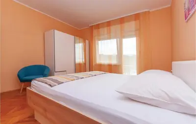 Krevet ili kreveti u jedinici u objektu Holiday Home Dolac With Sea View 06