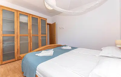 Krevet ili kreveti u jedinici u objektu Holiday Home Mravnica 09