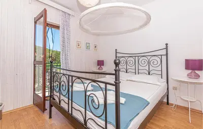 Krevet ili kreveti u jedinici u objektu Holiday Home Mravnica 09