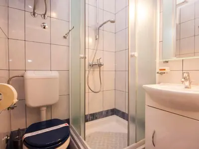 Kupaonica u objektu Apartments Grivičić