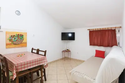 TV i/ili zabavni centar u objektu Apartments by the sea Grebastica, Sibenik - 4881