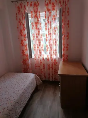 Krevet ili kreveti u jedinici u objektu Apartments by the sea Rogoznica - 1115