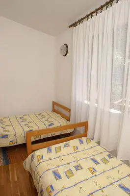 Krevet ili kreveti u jedinici u objektu Apartments by the sea Rogoznica - 1115