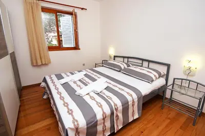 Krevet ili kreveti u jedinici u objektu Apartments by the sea Zaboric - Sibenik - 468