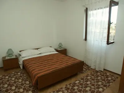 Krevet ili kreveti u jedinici u objektu Apartments by the sea Zaboric, Sibenik - 2190