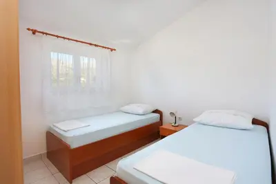 Krevet ili kreveti u jedinici u objektu Apartments by the sea Grebastica, Sibenik - 471