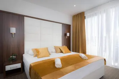Krevet ili kreveti u jedinici u objektu Hotel Perla