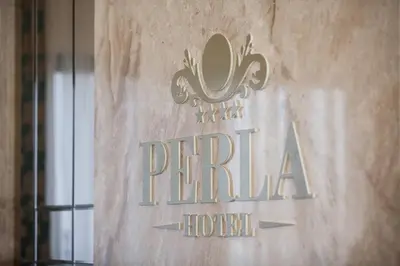Certifikat, nagrada, logo ili neki drugi dokument izložen u objektu Hotel Perla