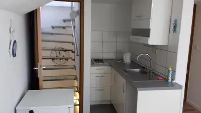 Kuhinja ili čajna kuhinja u objektu Apartments MIME - Small House