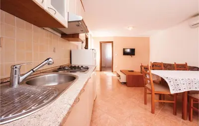 Kuhinja ili čajna kuhinja u objektu Apartment Sibenik With Sea View Xi