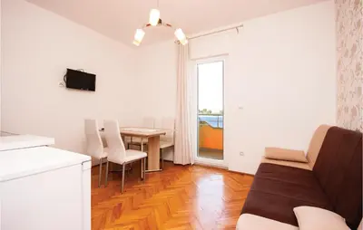 TV i/ili zabavni centar u objektu Apartment Sibenik With Sea View Xiii