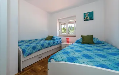 Krevet ili kreveti u jedinici u objektu Holiday Home Bilice Xiv