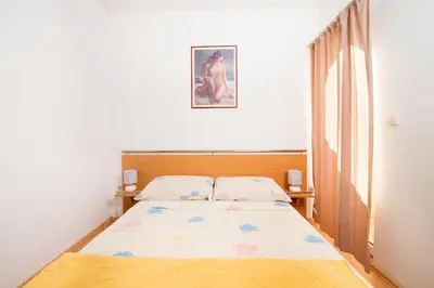 Krevet ili kreveti u jedinici u objektu Apartments Ksenija