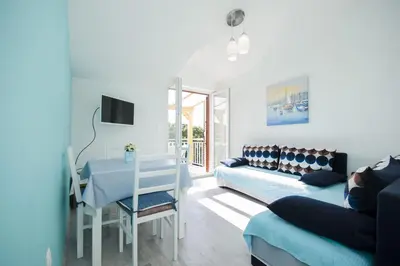 TV i/ili zabavni centar u objektu Apartments Summertime