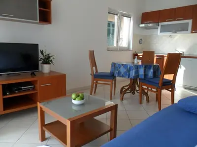TV i/ili zabavni centar u objektu Apartments & Room Marina View