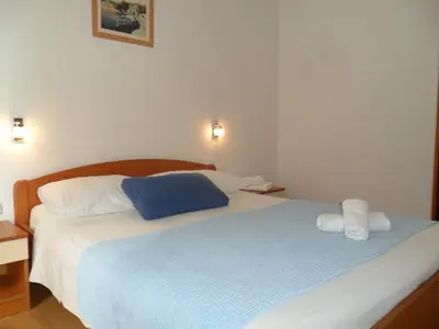 Krevet ili kreveti u jedinici u objektu Apartments & Room Marina View