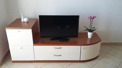 TV i/ili zabavni centar u objektu Apartments & Room Marina View